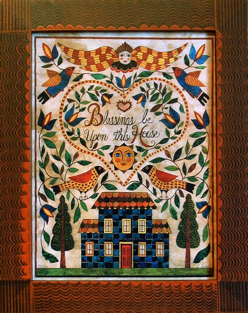 Framed fraktur reproduction print of a blue house with trees, birds, and angels