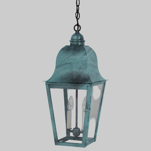 Vintage-style hanging lantern with a greenish-blue finish on a white background