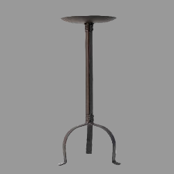 A black iron pillar holder with three legs and a round candle dish at the top
