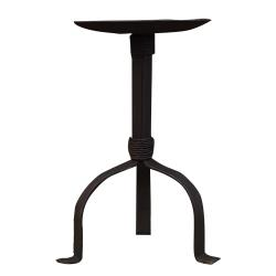 A black iron pillar holder with three legs and a round candle dish on top.