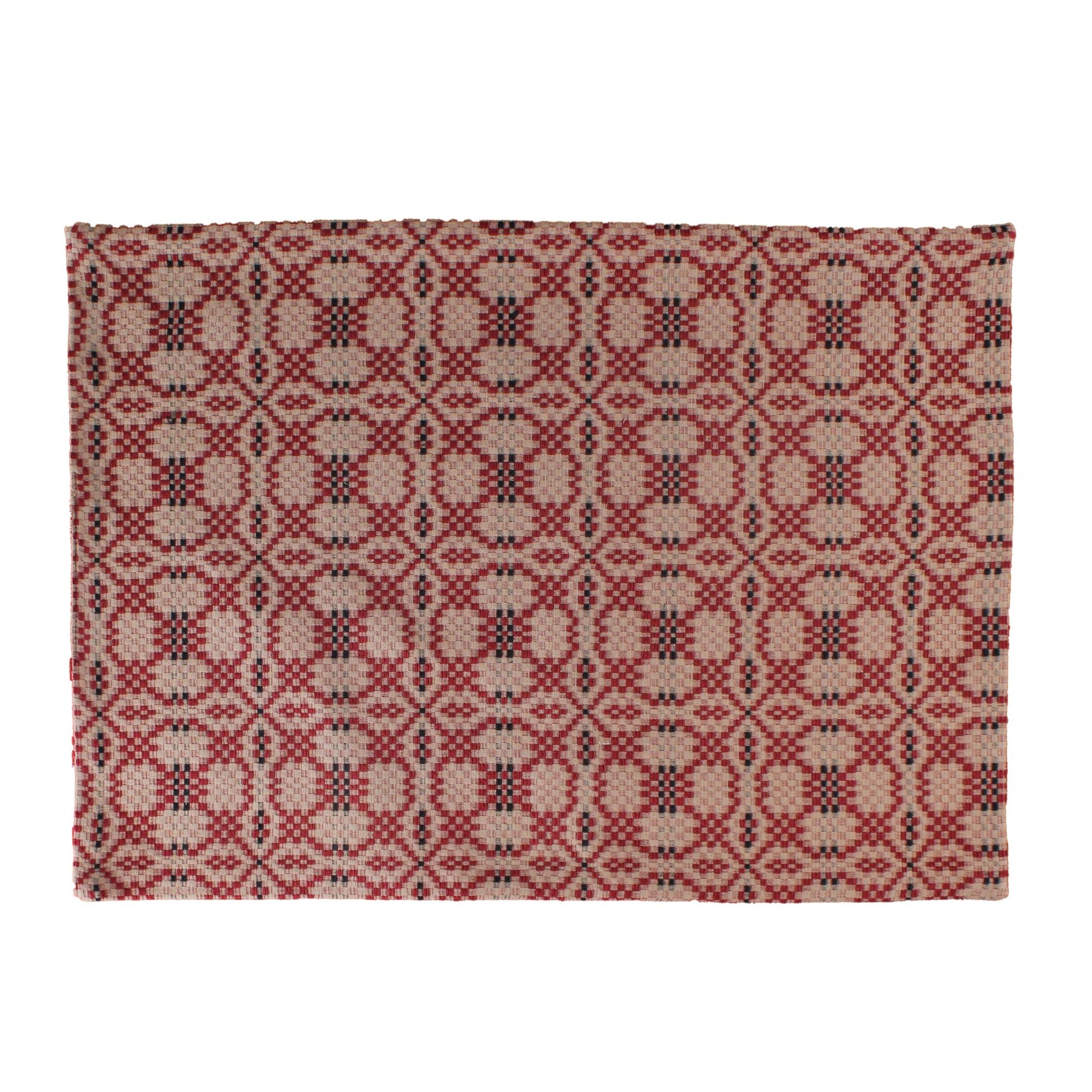 A rectangular Kendall Jacquard Red Placemat with an intricate geometric pattern.