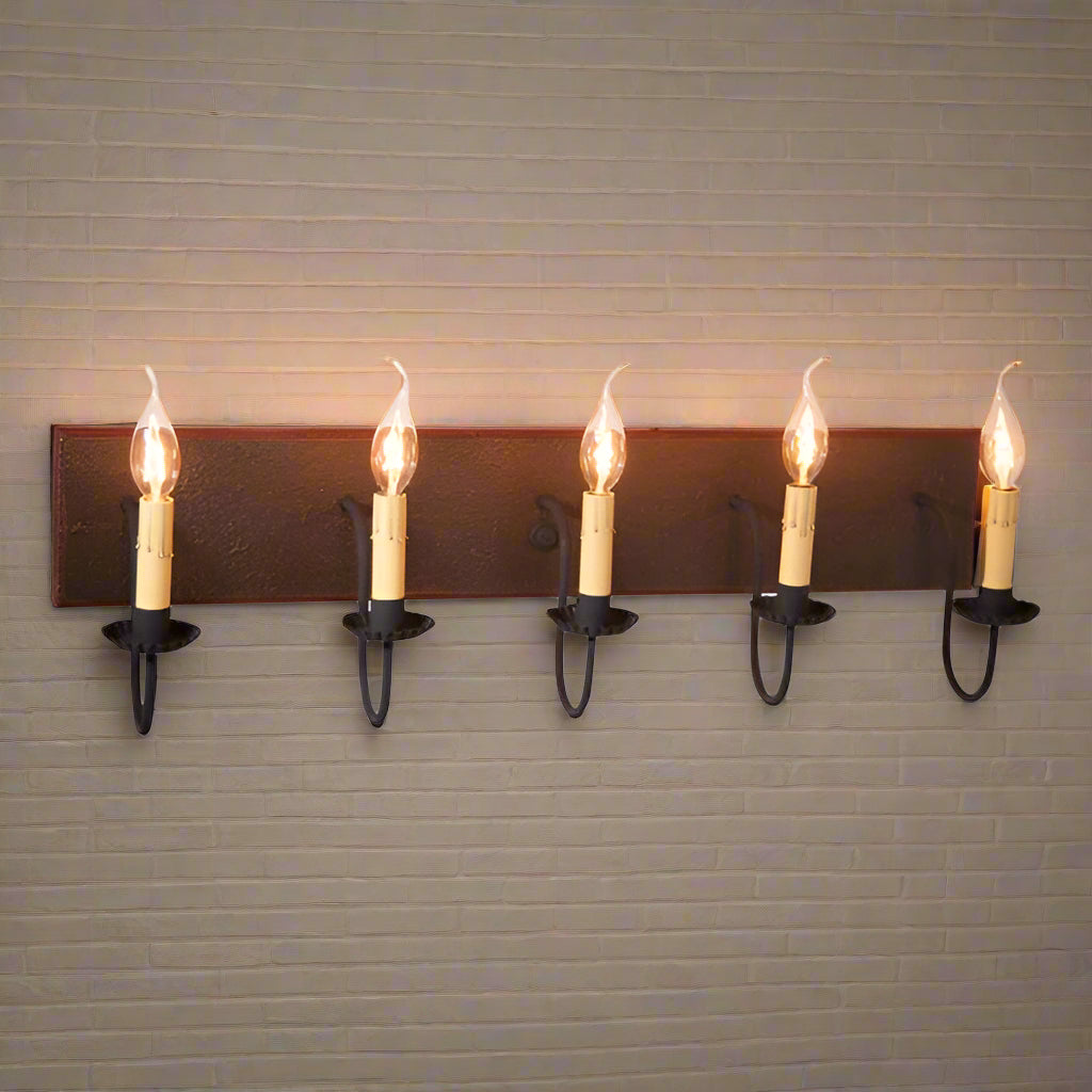 A five-light vanity light fixture with an espresso finish and textured black arms, featuring E12/Candelabra sockets.