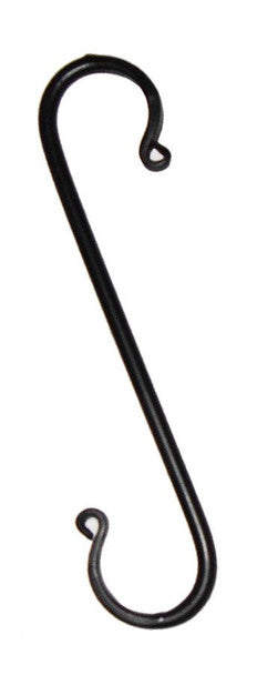 Large wrought iron forged s hook on white background.