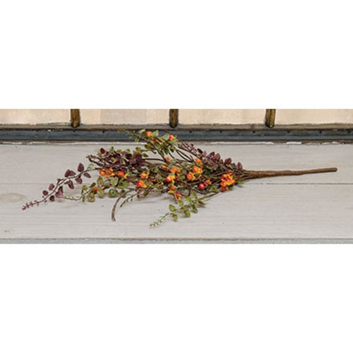 Realistic leaf and bittersweet spray on windowsill