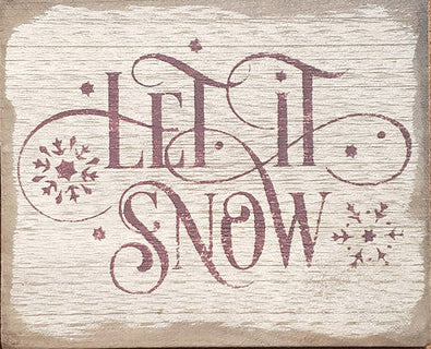 Weathered sign with the words "Let It Snow" and snowflakes on a wooden background