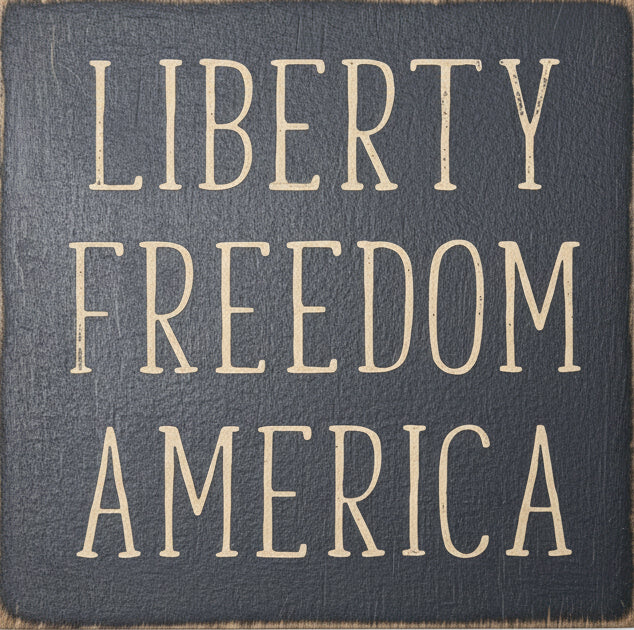 Decorative sign with 'Liberty Freedom America' text on a gray background