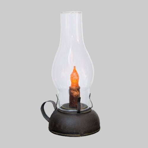 A smoky black tin library lantern with a strap metal handle and a glass chimney, featuring a battery-operated LED candle inside.