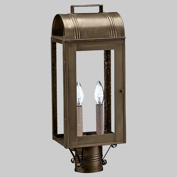 Bronze outdoor lamp with two glass shades on a gray background