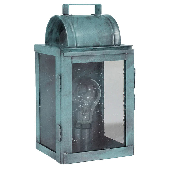 Vintage-style teal lantern with a clear glass cover on a white background
