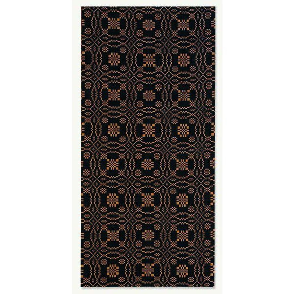 A jacquard towel with a geometric pattern in black and brown colors.