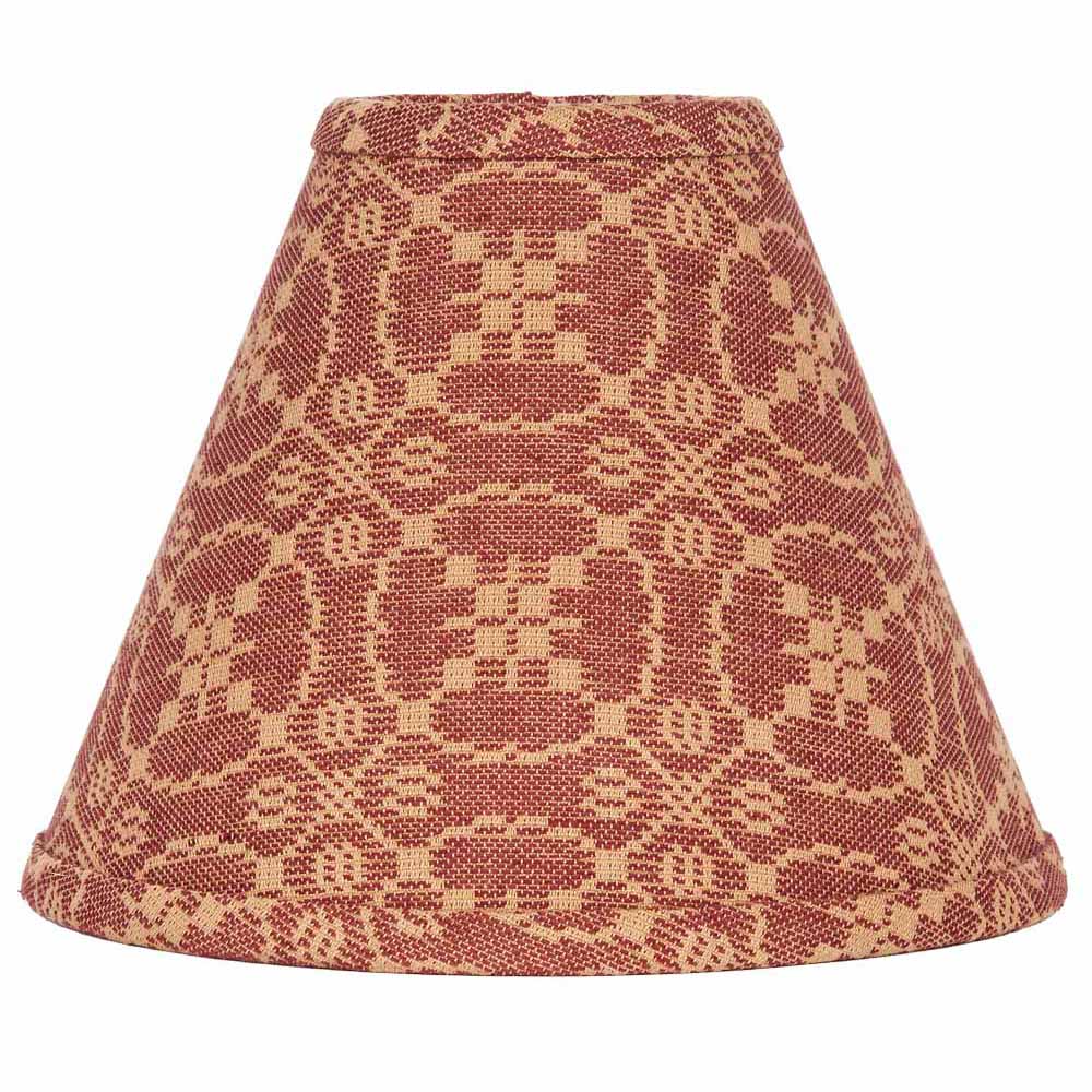 A barn red, tan Marshfield Jacquard lampshade with a geometric pattern, made of cotton, trimmed with self bias and side stitched.
