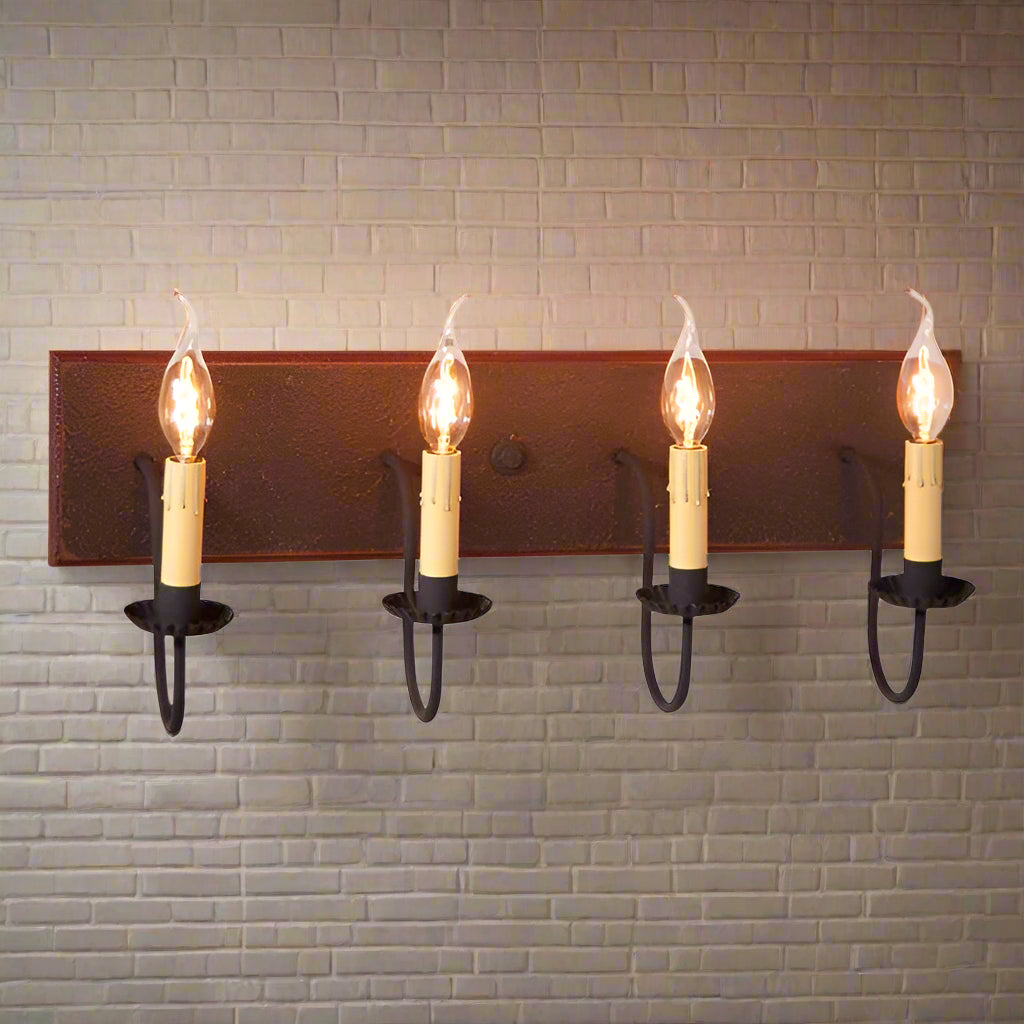 Primitive vanity light with four candelabra sockets in espresso with salem brick paint finish.