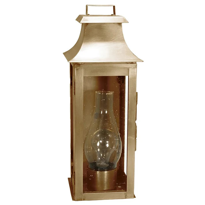 Brass lantern with clear glass on a white background