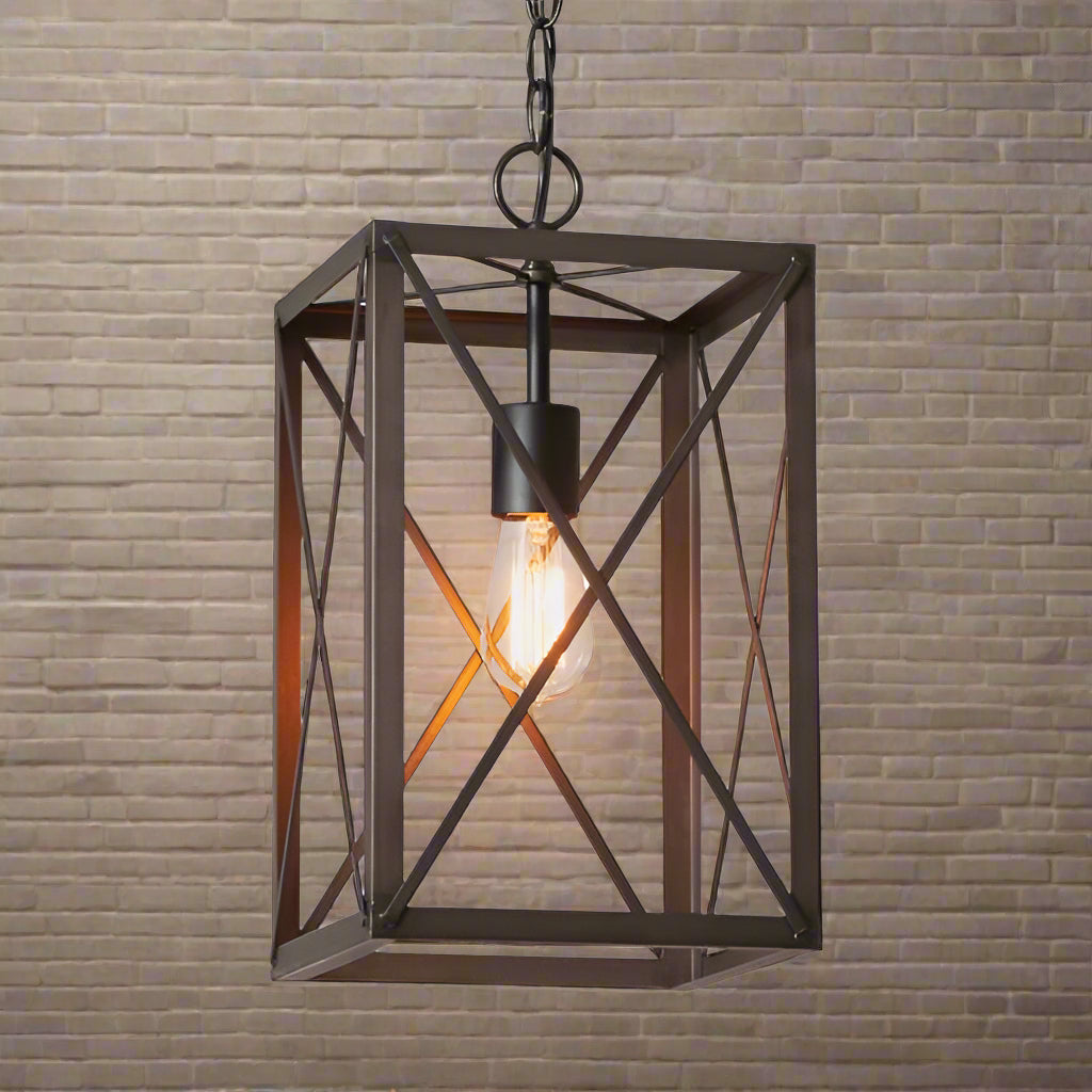 A square metal pendant light with a crossbar design, featuring a single bulb and a hanging cord.