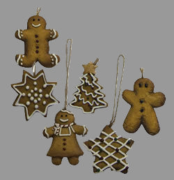 Mini gingerbread cookie ornaments on white background
