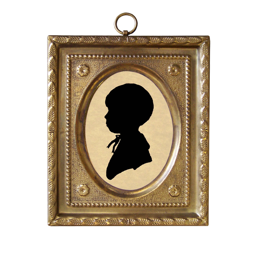 A brass frame miniature silhouette artwork featuring a black and white image of a boy.