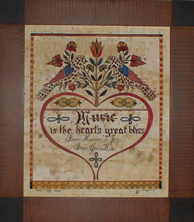 A signed and numbered limited edition fraktur print featuring a heart-shaped design with musical instruments and the word 'MUSIC' in the center.