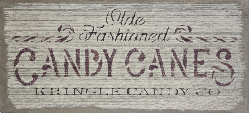 Weathered sign advertising candy canes.