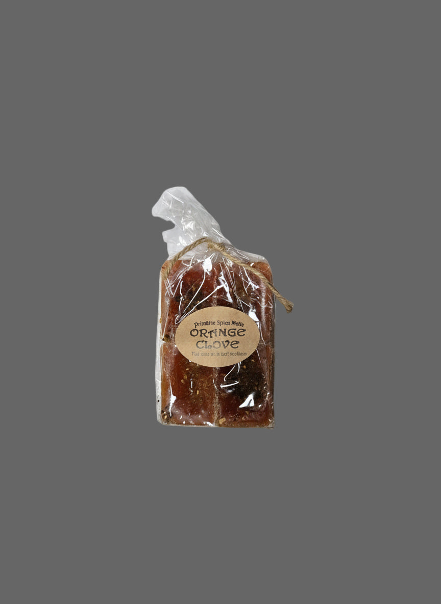 Packaged product labeled 'Orange Clove' on a gray background