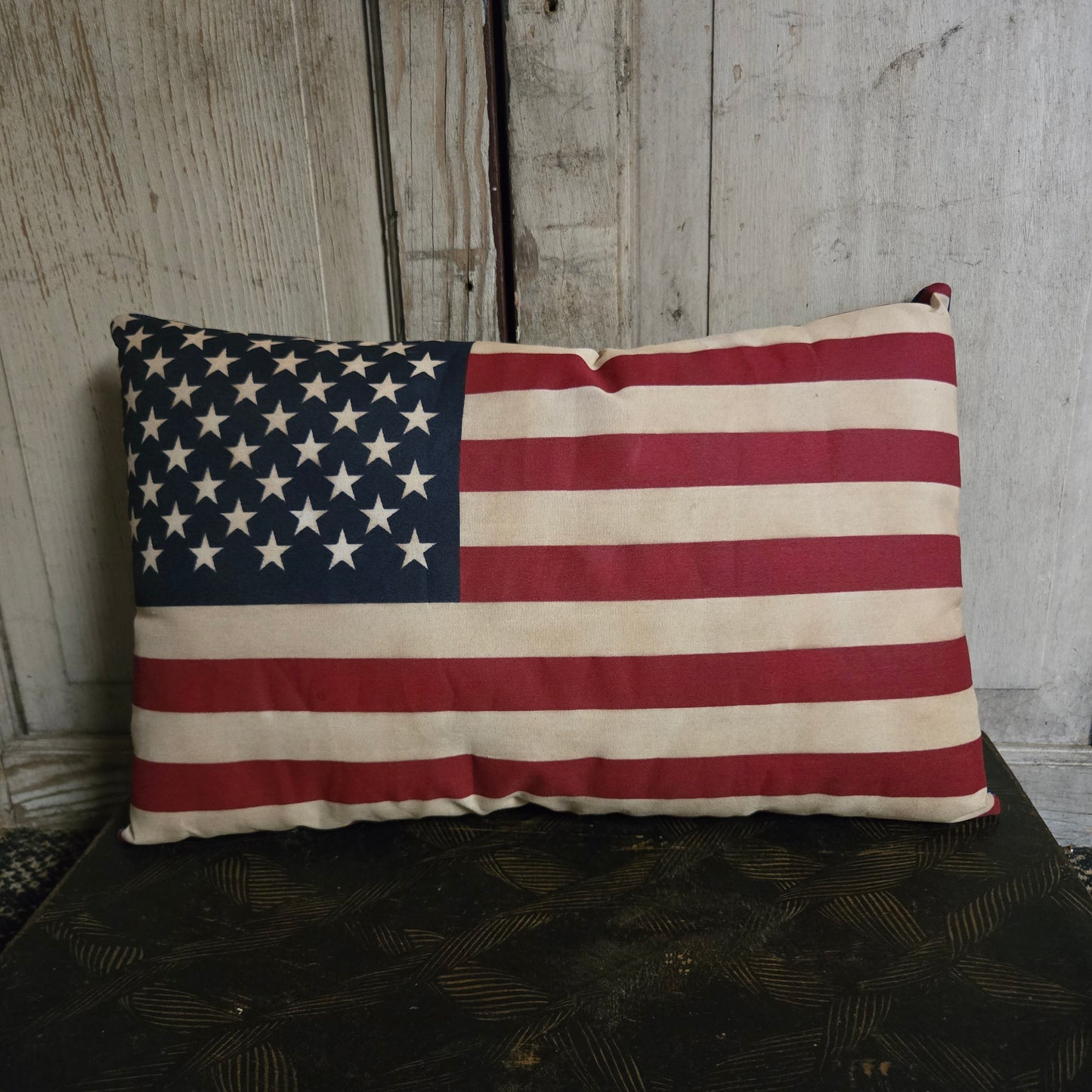 Americana Flag Pillow in front of white background
