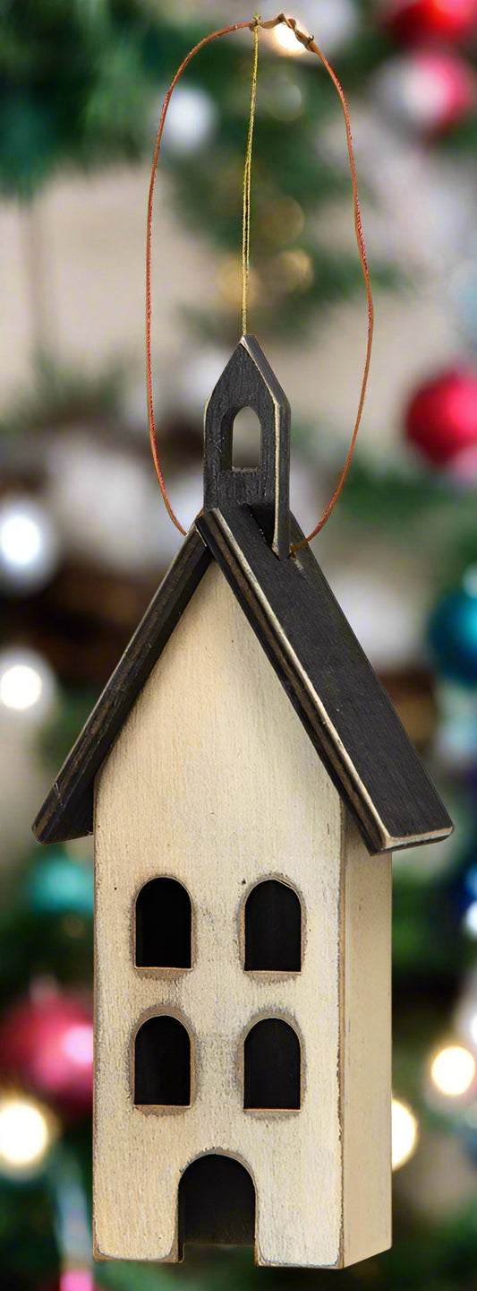 White church ornament with hanger on white background