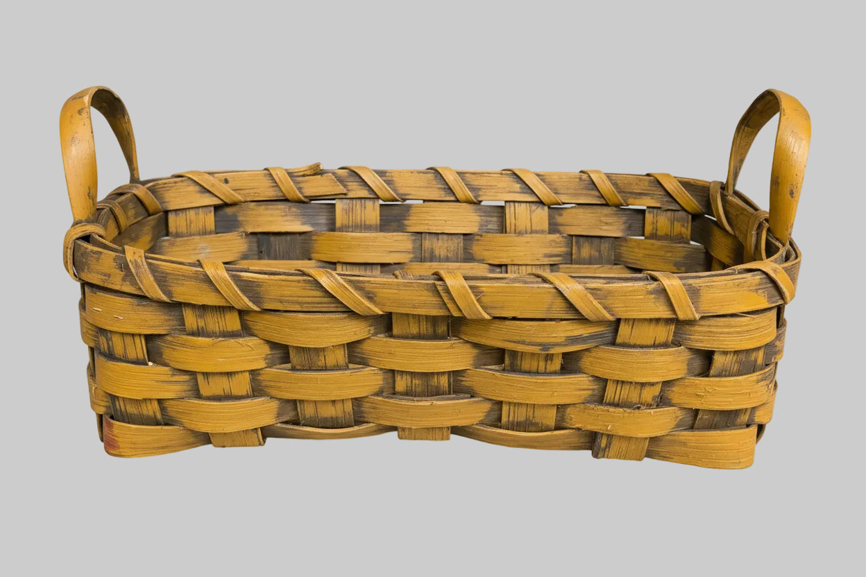 Woven mustard basket on a dark wooden background