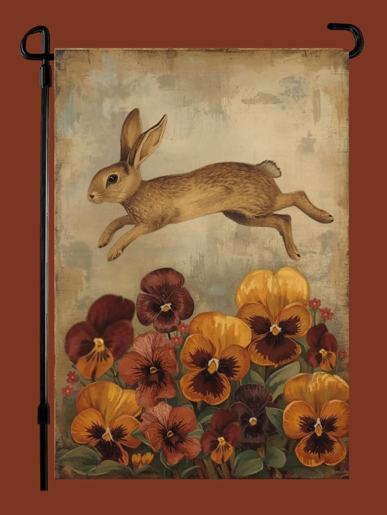 Decorative flag with a rabbit and flowers on a textured background
