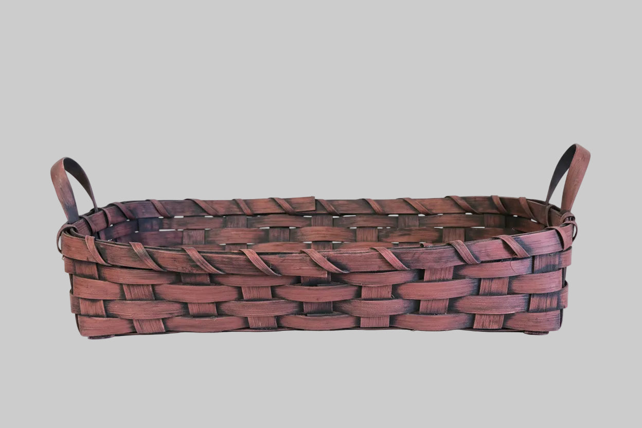 Woven basket on grey background