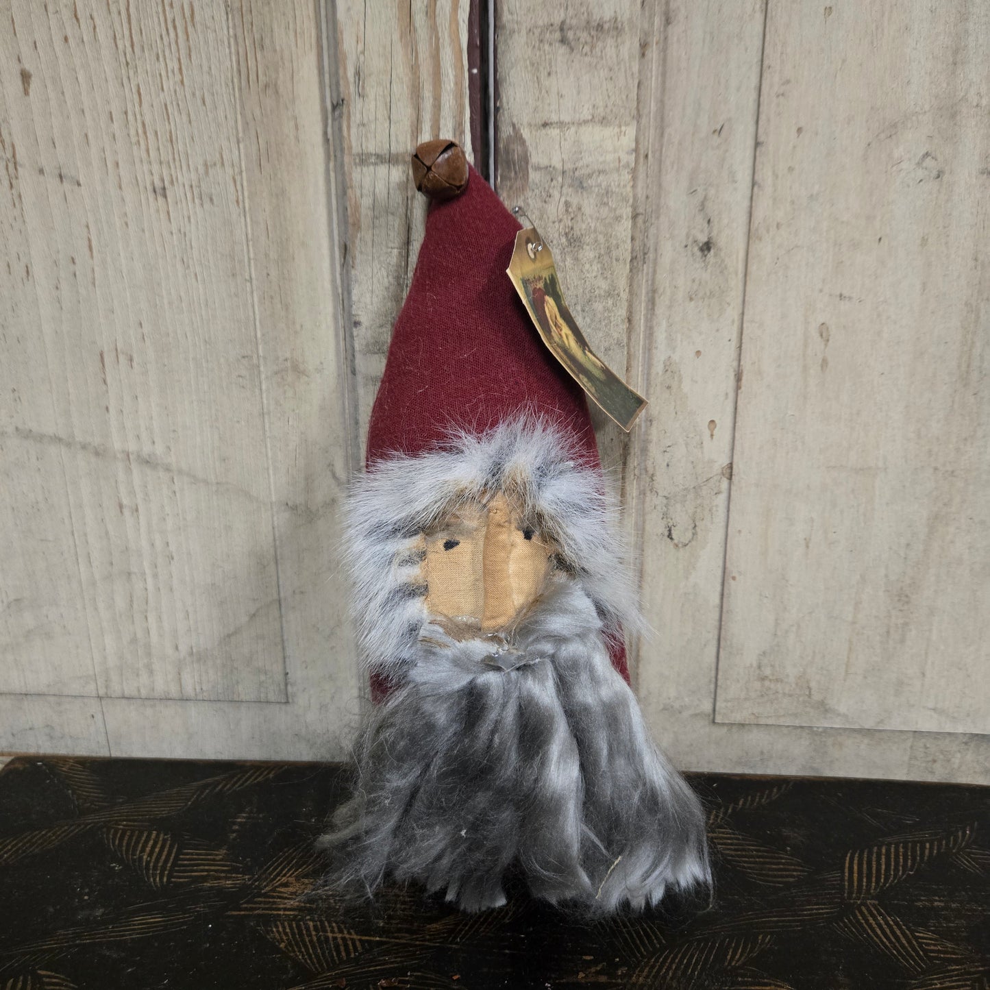 Small decorative figure on a wooden surface