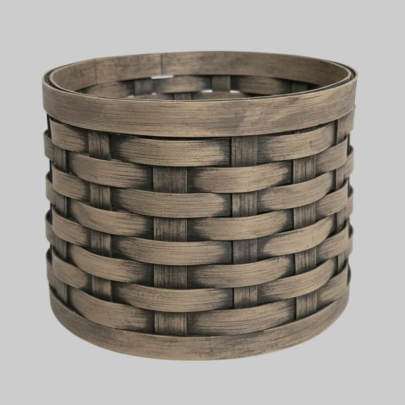 Woven basket against a textured wall