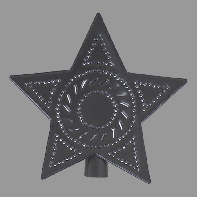 A smokey black tin star tree topper with punched designs and a solid metal structure.