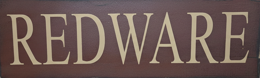 Wooden sign with 'REDWARE' text on a dark brown background