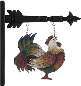 A multicolored resin rooster arrow replacement hanging on a black arrow shaft.