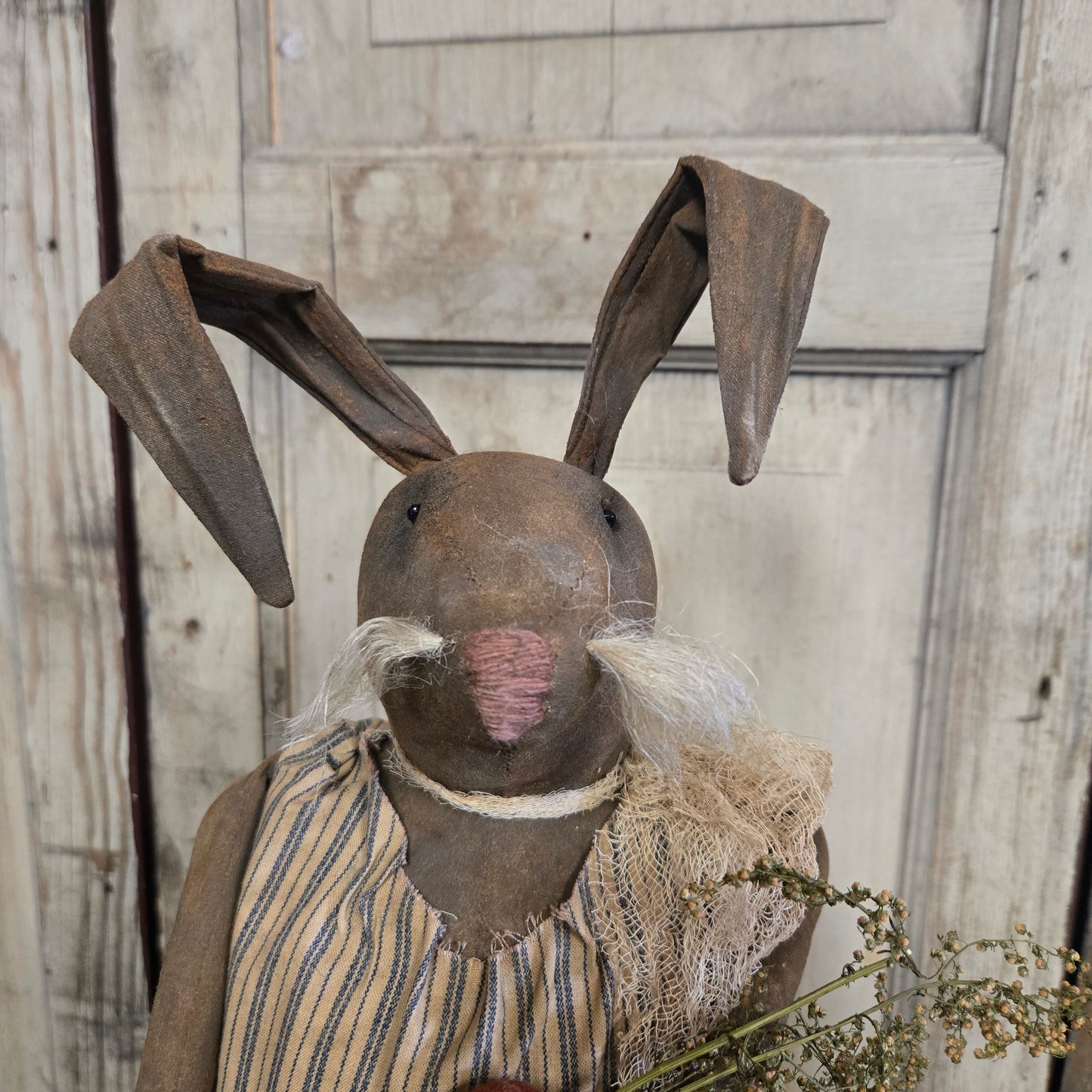 Primitive Bunny Holding Carrot