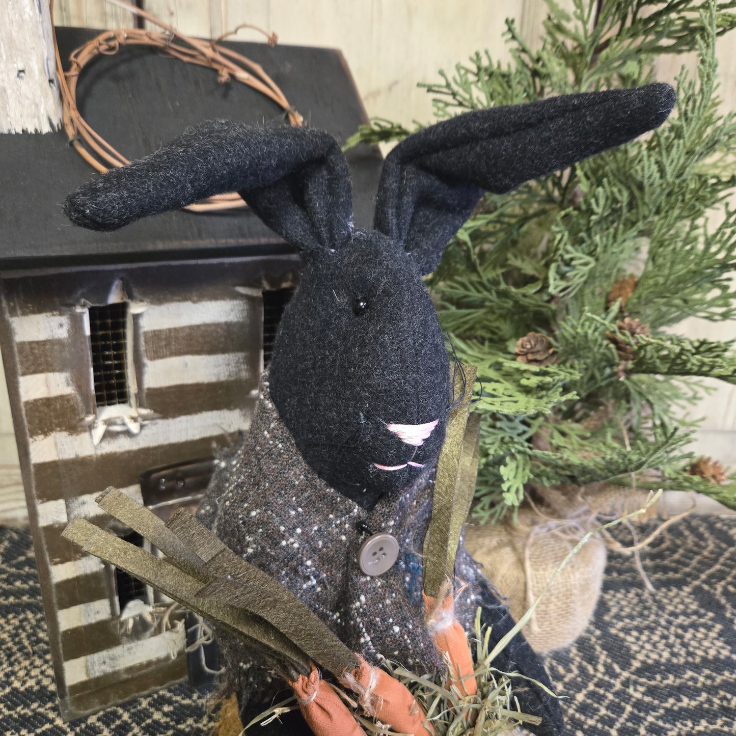 Primitive Black Bunny Holding Bag of Carrots