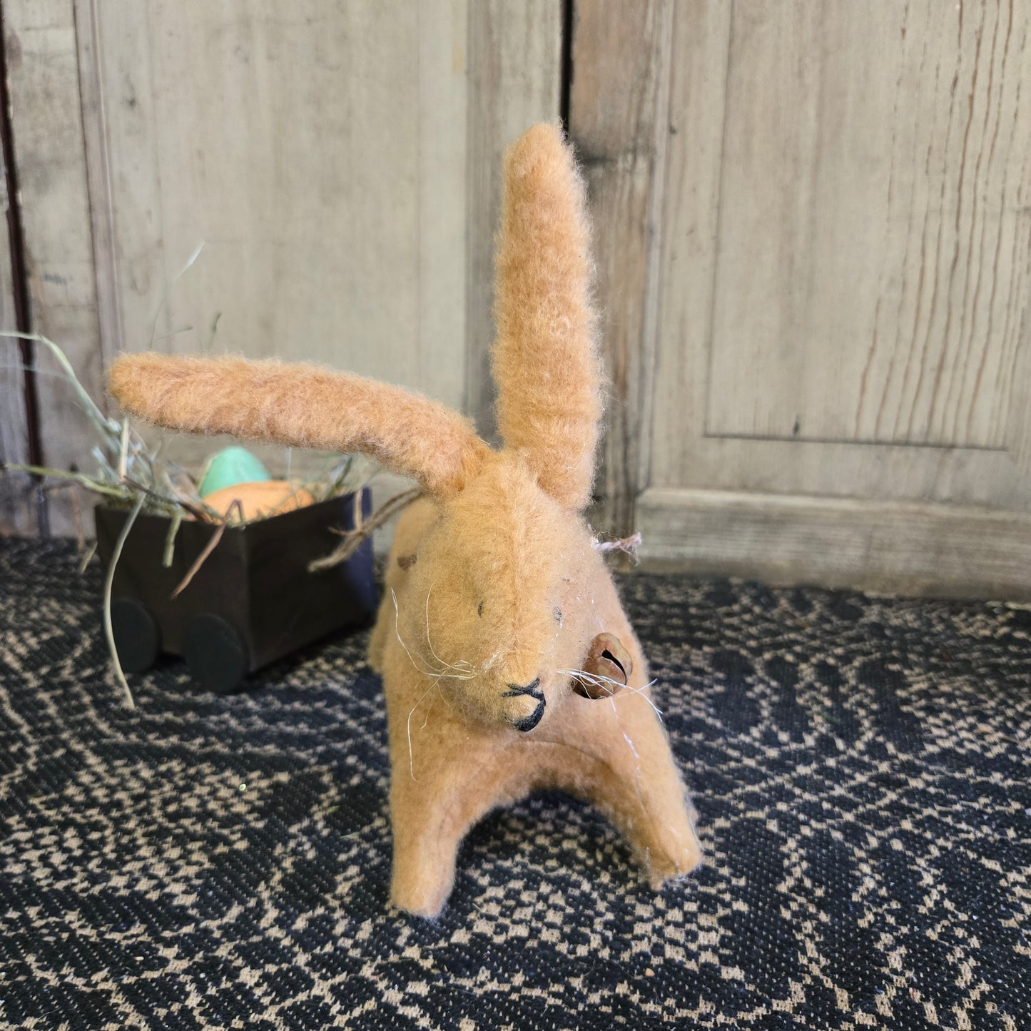 Bunny Pulling Brown Cart of Easter Eggs