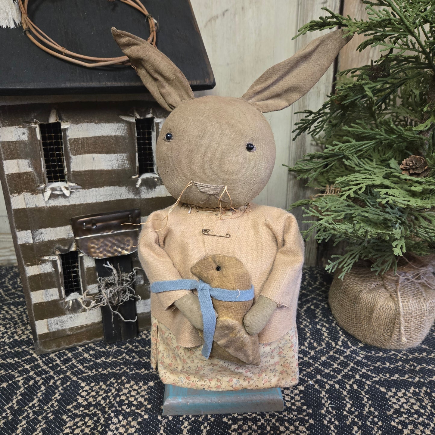 Primitive Bunny Holding Chick