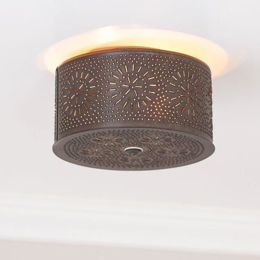 Decorative ceiling light fixture with chisel design on a white background