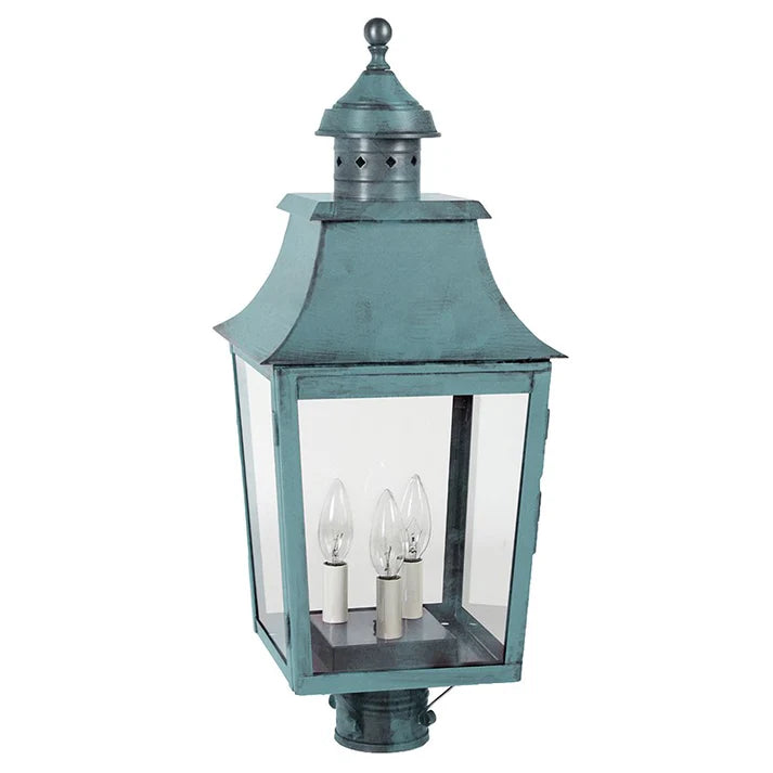 Vintage-style green lantern with clear glass on a white background