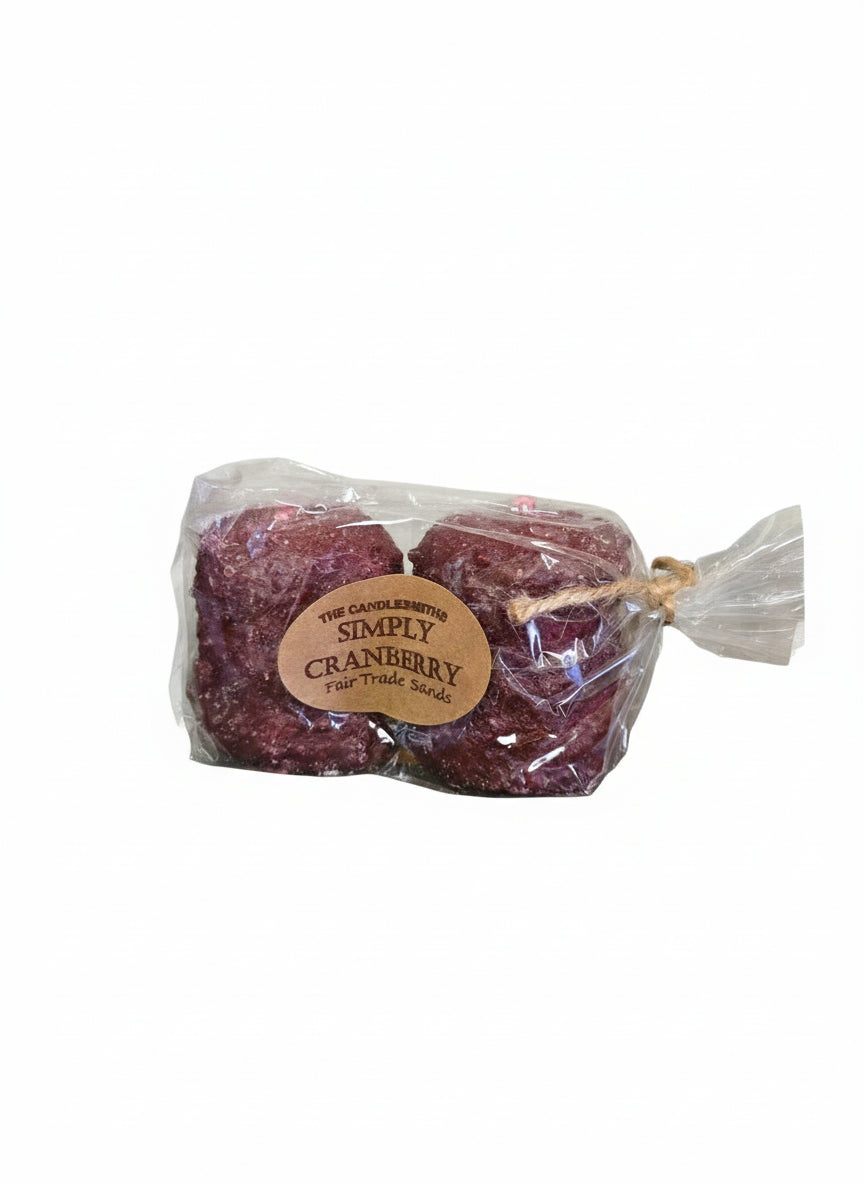 Two red cranberry votive candles packaged together with a label showing the brand and product name.