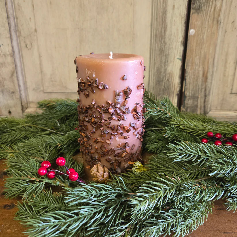 3x6 spice cake pillar candle with greenery and red berries