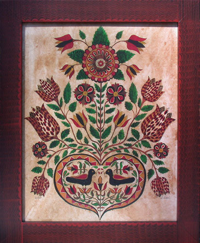 A framed print of a fraktur with tulips coming out a heart shape holding two birds