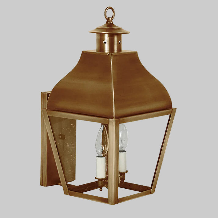 Bronze outdoor lantern with clear glass on a gray background