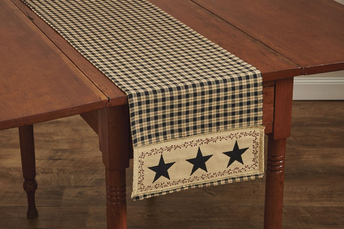 Table runner with star design on a wooden table