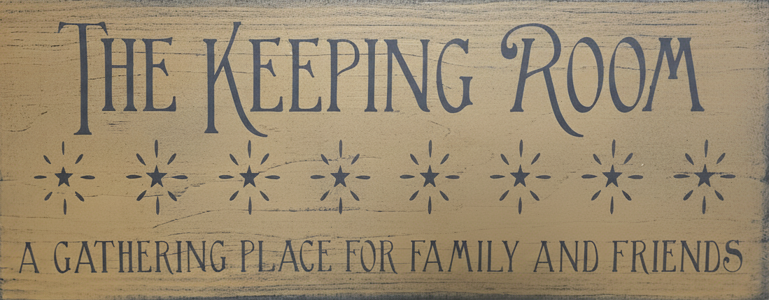Wooden sign with engraved text 'The Keeping Room' on a mustard background