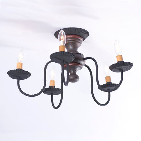 Black chandelier with multiple candle-style lights on a white background