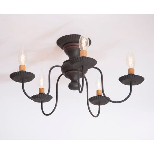 Black chandelier with multiple candle-style light fixtures on a white background