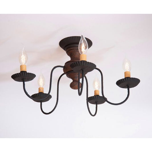 Black chandelier with six candle-style lights on a white background