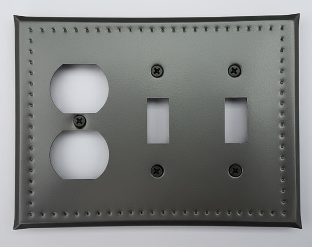 Decorative wall switch plate with two outlets and two switches on a light gray background