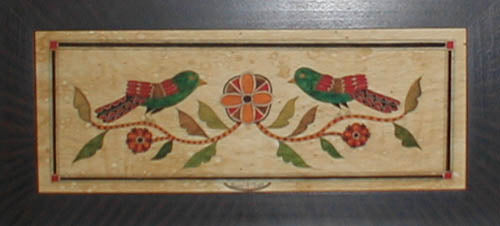 Framed print signed and numbered by the artist featuring two green birds on a vine